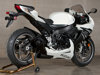 Black GP Slip On Exhaust w/ Carbon Fiber Heatshield - For 11-24 Suzuki GSXR600/750